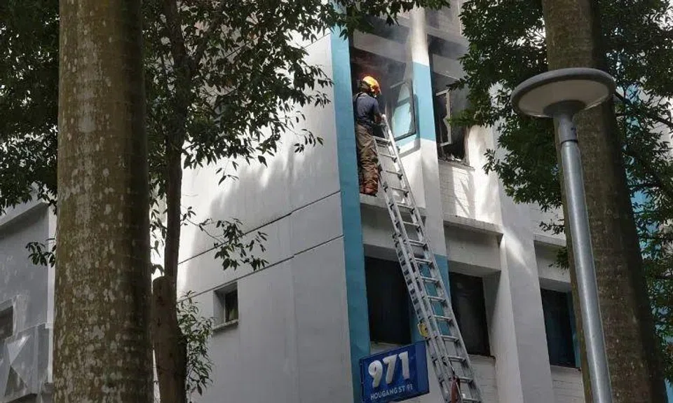 Firefighters forced entry into the affected unit, but encountered challenges entering due to excessive items inside.