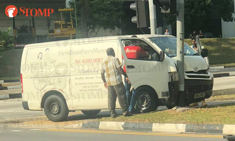 Driver taken to hospital after crashing van into traffic light at ...