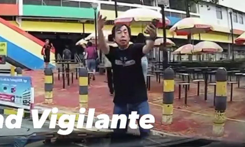 Man anyhow crosses road while using phone, chases and hits car after getting honked at