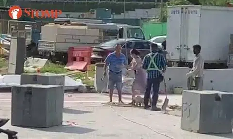 Stomper James, who shared the two-minute video, said that Ong "threatened to smash worker's head in with the hammer".