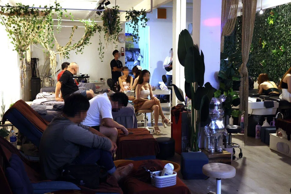 The police had raided three salons in Geylang on June 27.