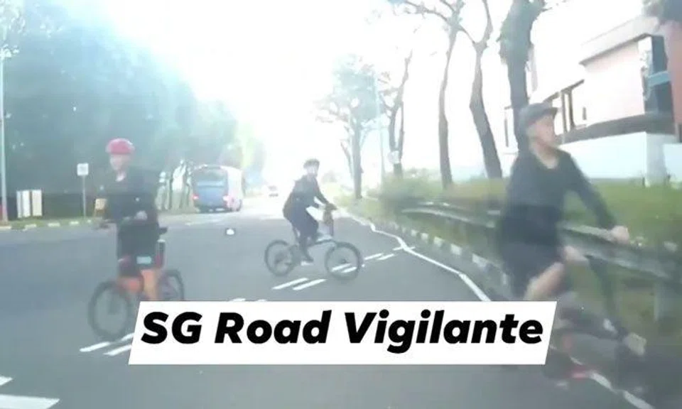 Cyclists riding against traffic give driver a shock at Woodlands Centre Road