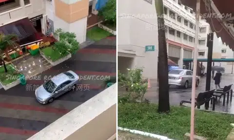 Car travels along pedestrian mall at Tampines