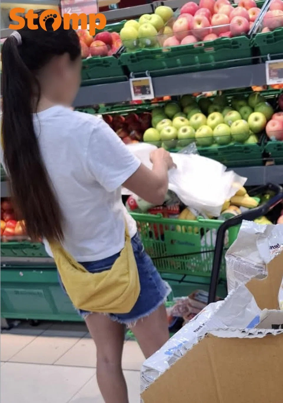 Shopper takes lots of plastic at Chinatown Point supermarket