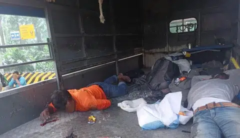 One worker was seen lying prone bleeding from his head, while another had blood on his shirt.