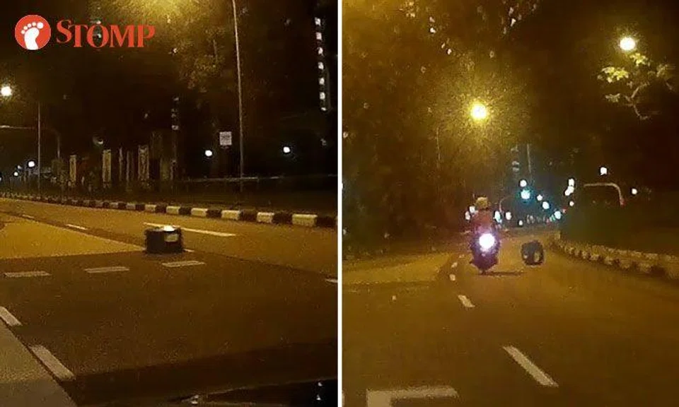 Did someone deliberately leave 2 dustbin covers in the middle of the road in Yishun?