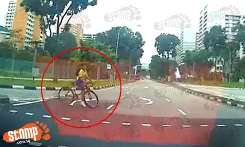 Reckless young cyclist along Hougang Ave 6 was THIS close to getting knocked down by car