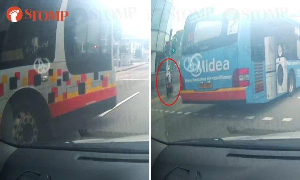 SMRT bus driver nearly causes accident by going out of lane, beats red light and ignores pedestrian