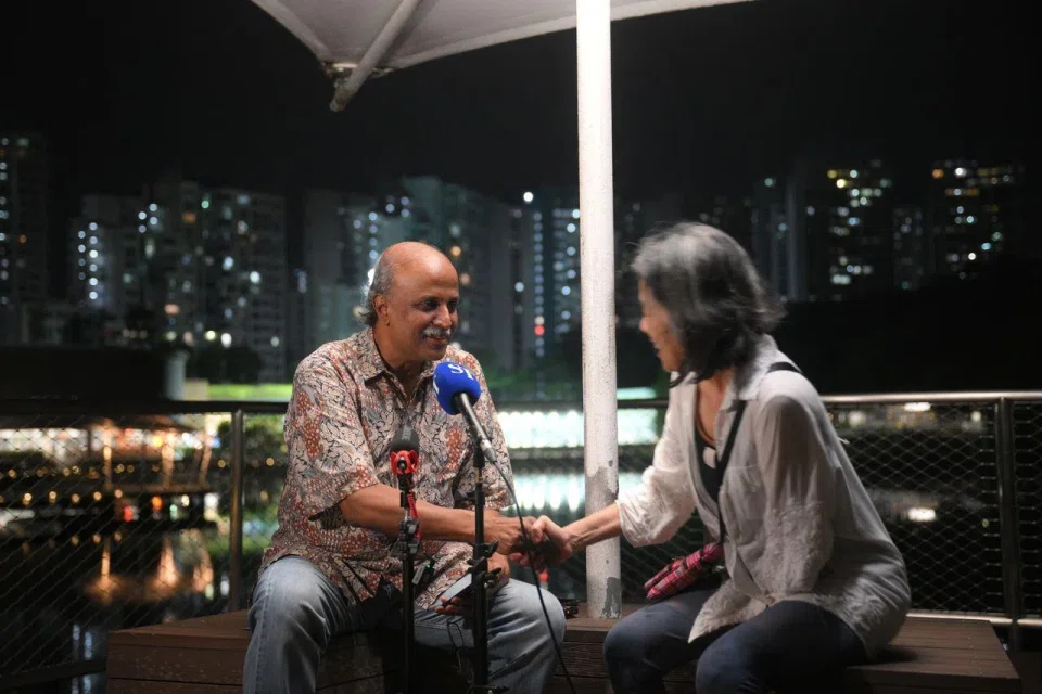 SDP chairman Paul Tambyah with a Bukit Panjang resident during a dialogue at Pang Sua Pond on April 8.
