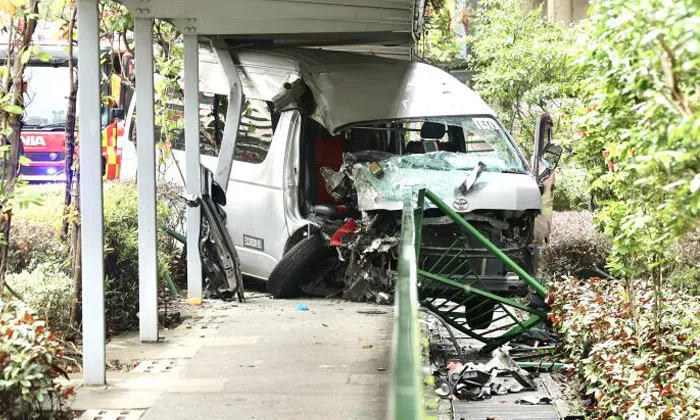 Van driver, 72, killed after crashing into covered walkway in Redhill ...