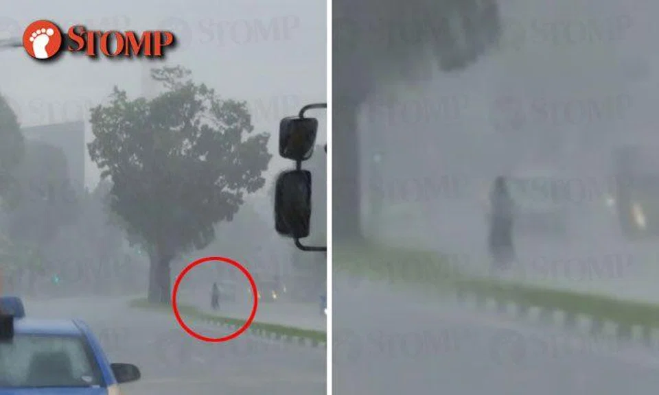 Driver snaps photo of building during downpour -- but what's that at the corner?
