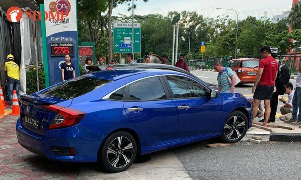 Driver loses control and crashes car onto kerb outside Lot One shopping mall