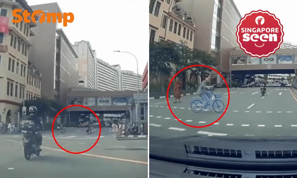 Pedestrian sprints across red light, cyclist follows suit in close calls caught on dashcam