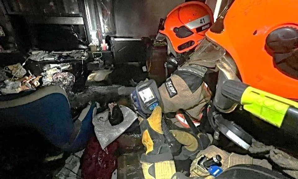 When SCDF arrived, the living room of a first-storey flat was on fire.