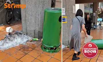 Moneylender staff extinguish bin fire in Chinatown before SCDF arrives