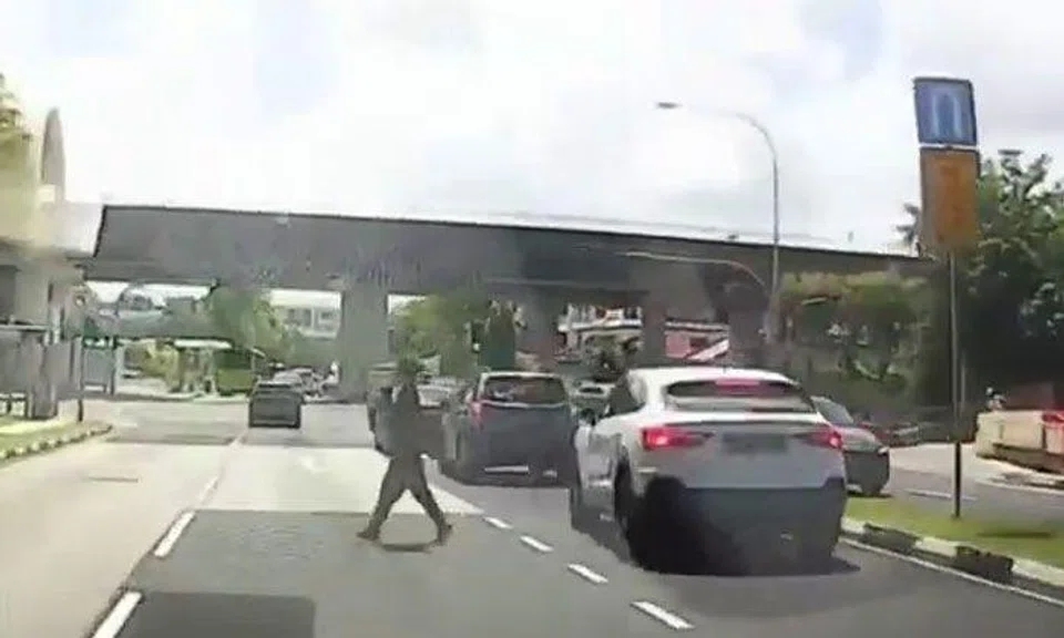 Woman has close shave with car after exiting Audi in the middle of Jalan Kembangan