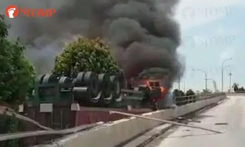 Driver, 68, taken to hospital after truck overturns and catches fire on West Coast Highway