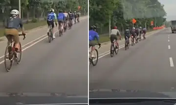 cyclists cycling lane tanah merah coast road roadway