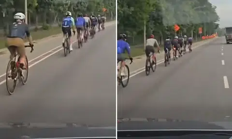 cyclists cycling lane tanah merah coast road roadway