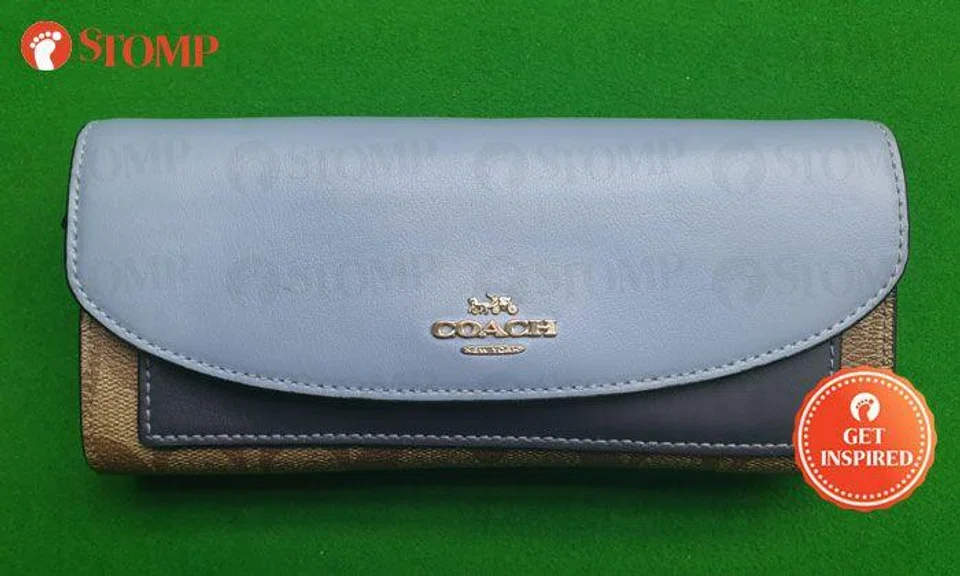 Passenger thankful to GrabHitch driver who went out of his way to return Coach wallet she left behind