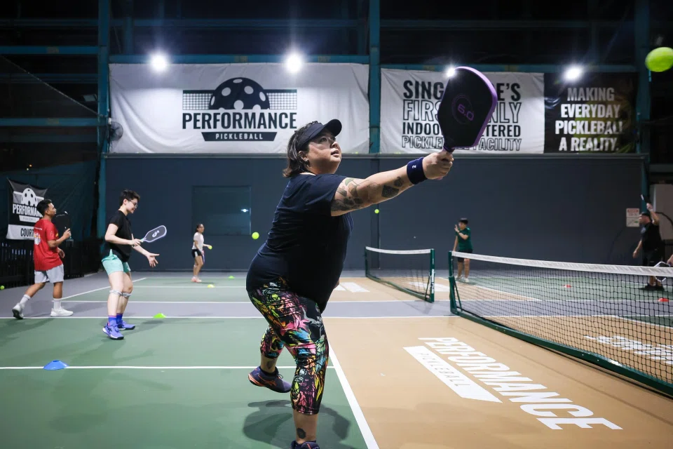 Video game producer Janine Campbell plays pickleball twice a week - once during a group lesson with Performance Pickleball, and the other with her family and friends.