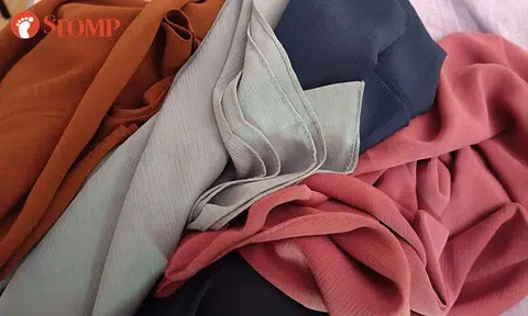 Stomper looking for owner of headscarves she found in her shopping bag at JB shopping mall