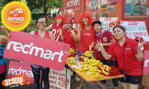 RedMart staff give Standard Chartered Marathon runners a boost -- with 66,000 bananas