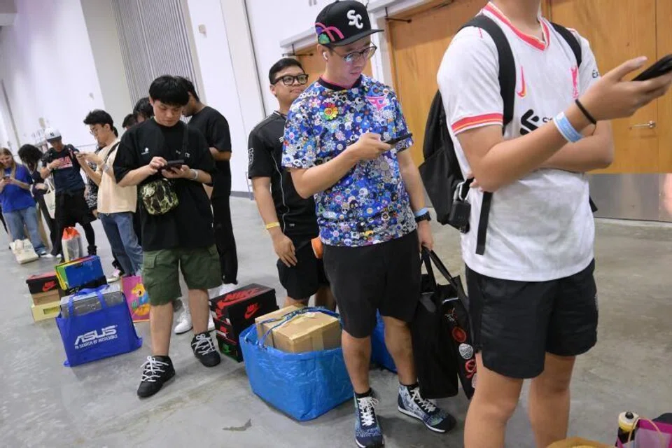 Sneaker aficionados in a queue to sell shoes to Culture Kicks.
