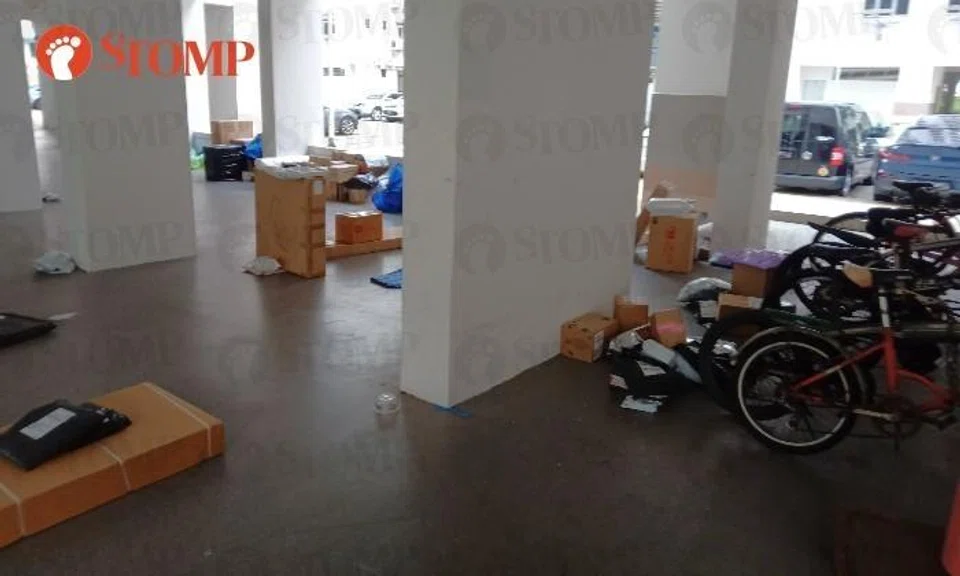 Parcels strewn all over the void deck of Block 329 Woodlands Street 32