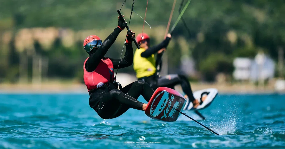 Singapore's Maximilian Maeder (in red vest) retaining his Formula Kite European Championships crown after defeating Riccardo Pianosi (in yellow vest) in the medal series on May 19.
