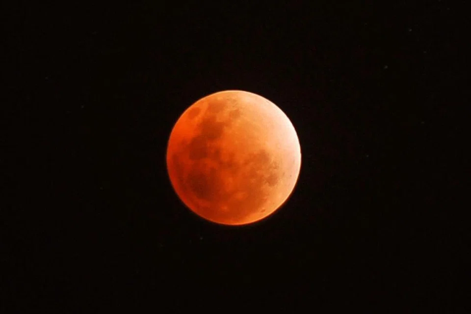 A blood moon during a total lunar eclipse on Dec 10, 2011.