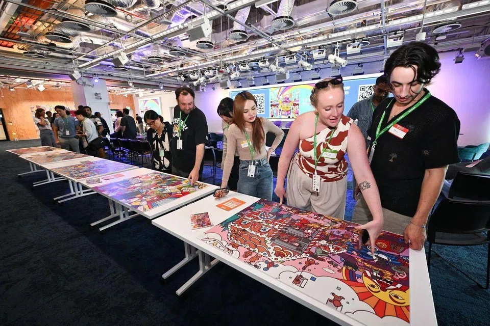 Participants taking part in an interactive workshop session during Meta's Inside a Scammer’s Mind event at Marina One on June 12.