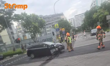 Black car involved in a car accident