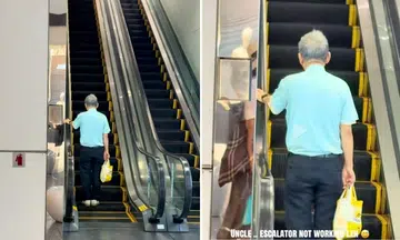 elderly man standing on stationary escalator