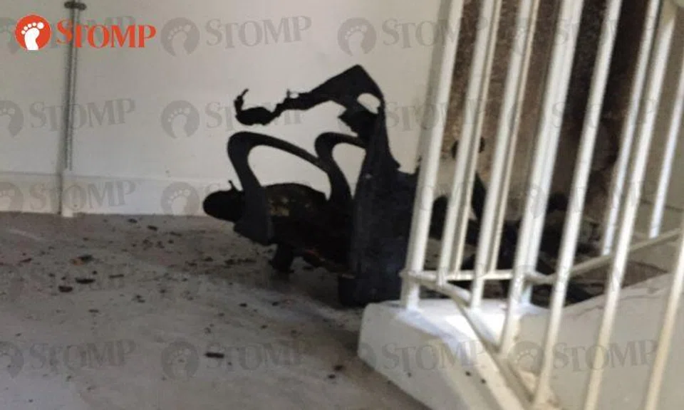 Discarded items at Ang Mo Kio void deck and staircase landing catch fire