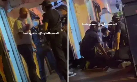 Screen shots of video of man arguing with police officers.