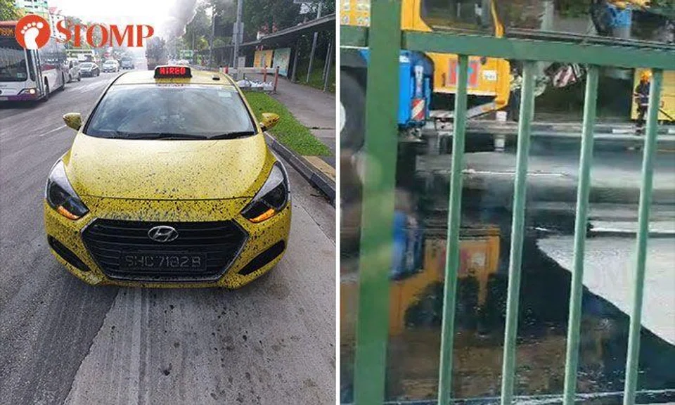 Taxi gets splashed with black oil after accident along Jurong Town Hall Road
