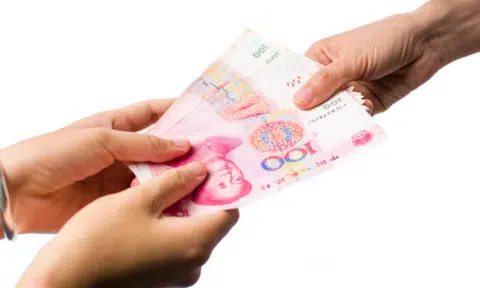 The defendant attempted to bribe an ICA officer with 100 yuan (S$18.60). 