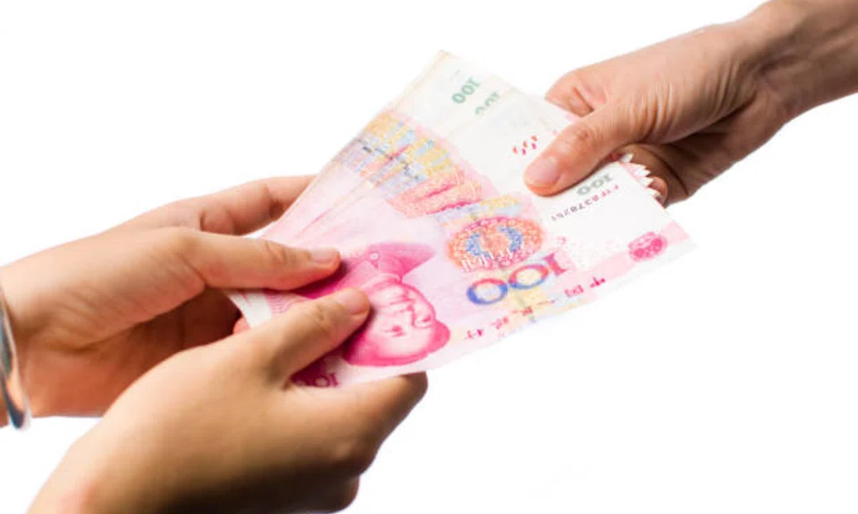 The defendant attempted to bribe an ICA officer with 100 yuan (S$18.60). 