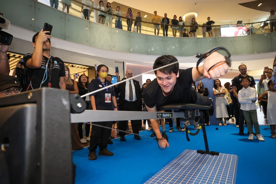 Singapore's Rio Olympic swimming champion Joseph Schooling taking part in the Vasa Trainer Experience activity at World Aquatics Championships Community Roadshow in ION Orchard on May 9.