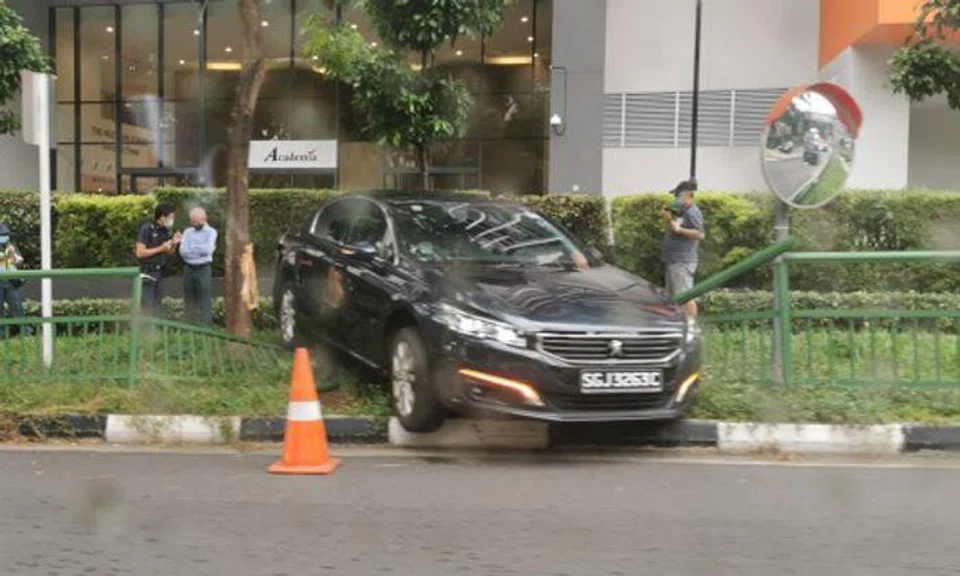 Car crashes through railing near Singapore General Hospital