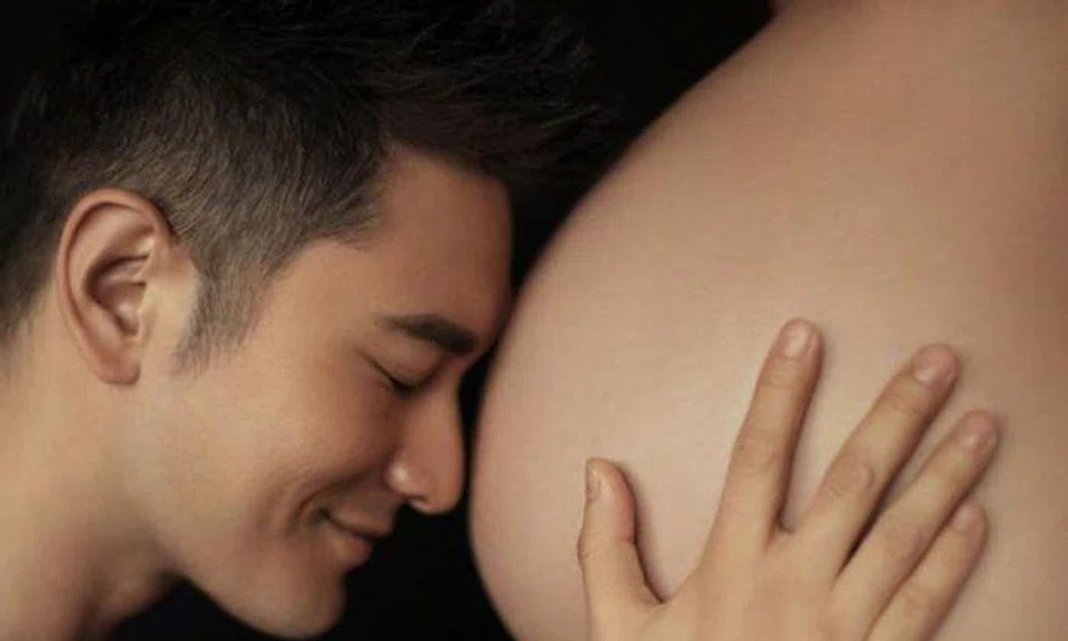 Huang Xiaoming quashes rumours of wife's surrogacy with pregnancy photoshoot
