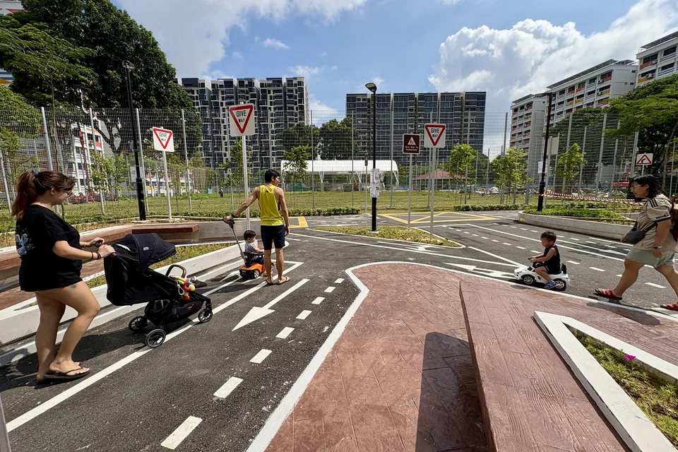 The park is a miniature road network, complete with directional arrows, zebra crossings and yellow boxes.