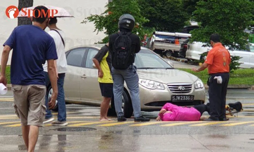64-year-old female cyclist hit by car in AMK, 68-year-old driver assisting with investigations