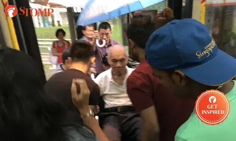 Foreigners come together to help man in wheelchair alight at AMK bus stop