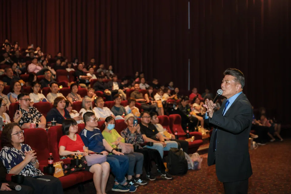 Singaporean director Jack Neo addressing the crowd during the event at Golden Village VivoCity. ST PHOTO: GAVIN FOO