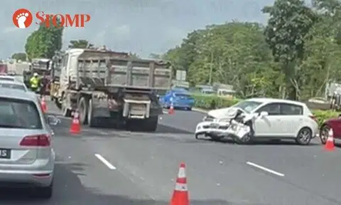 Stomper Lim shared a video of the accident's aftermath showing the damaged white Nissan car behind two tipper trucks and a trailer on the expressway.