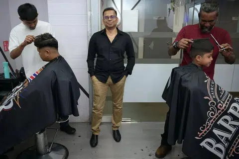 In 2017, Mr Veerappan Muthukumaran decided to offer seniors and persons with disabilities a free cut at his shops so that more people can benefit from the service.