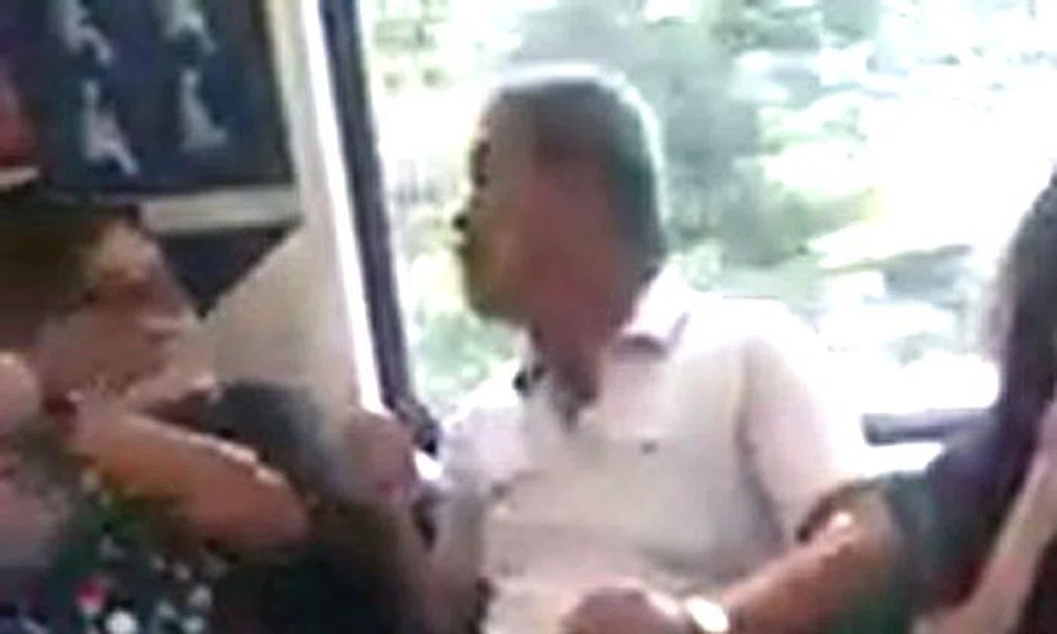 Uncle and auntie have vulgar shouting match on train after he allegedly kicks her