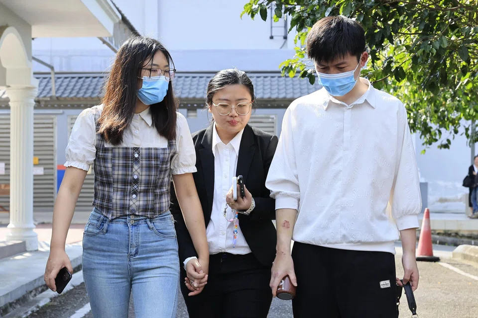 Shi Qian (left) and Xu Jianfeng (right) pleaded guilty on Feb 14 to the charge of deliberating causing disturbance by engaging in obscene behaviour in public.